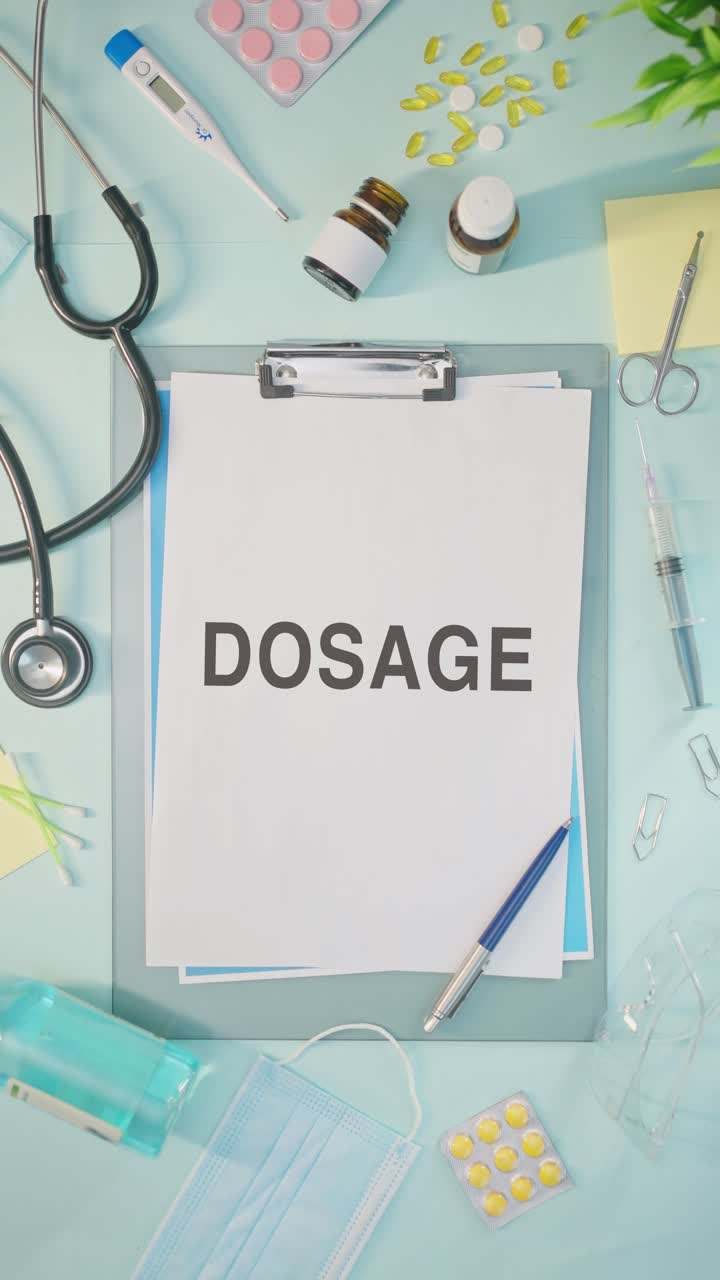 VERTICAL VIDEO OF DOSAGE WRITTEN ON MEDICAL PAPER