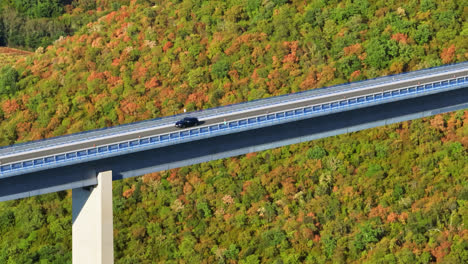 Telephoto-drone-shot-of-traffic-on-a-bridge-in-middle-of-drought-of-Istria,-Croatia