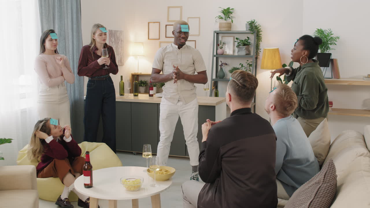 Happy Young People Playing Guessing Game