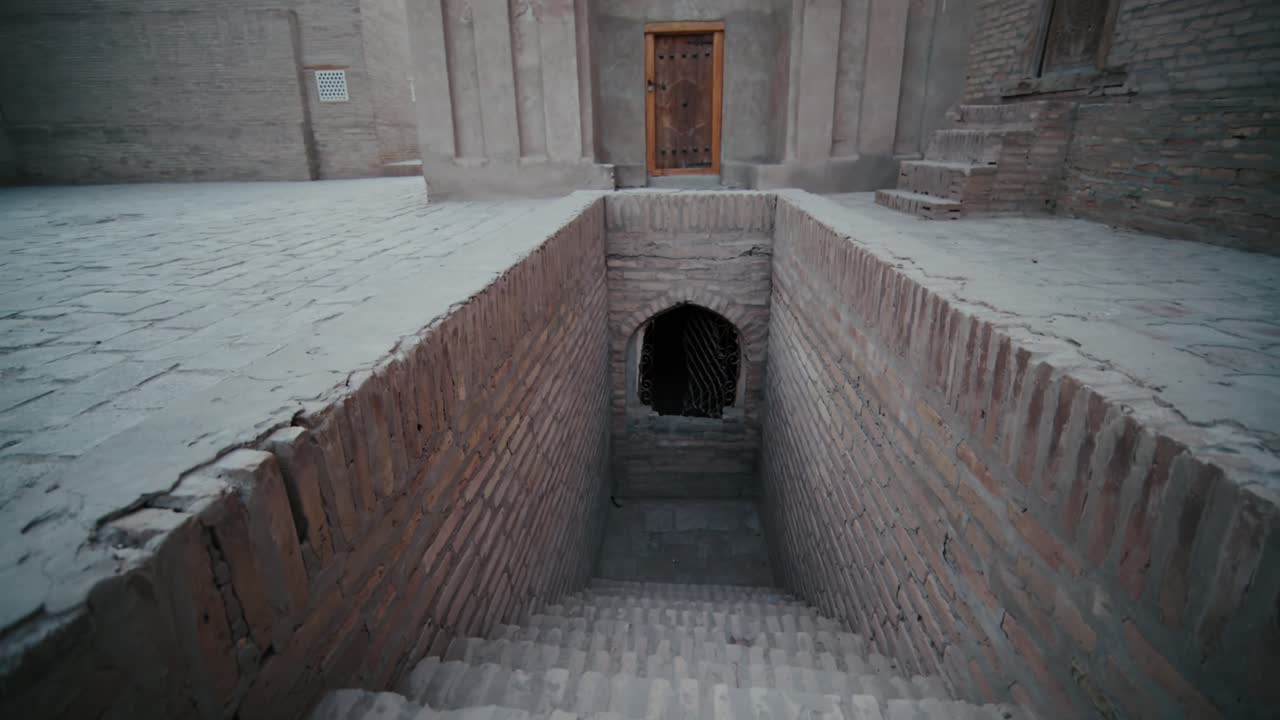 Khiva old city entrance to the dungeon in the evening. Uzbekistan Silkroad