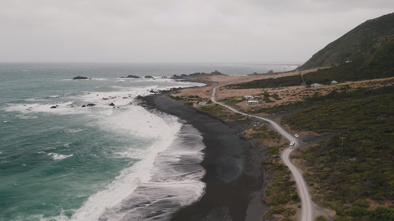 Aerial View of Black Sand Beach and Coastal Road