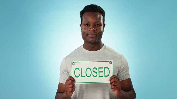 Business owner, closed sign