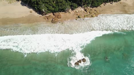 aerial drone view of hot water beach along the coromandel peninsula in new zealand