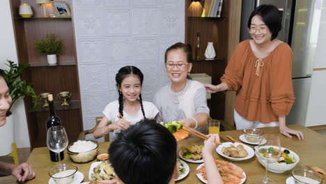 asian family having lunch.