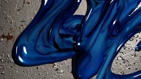 blue paint spill on concrete