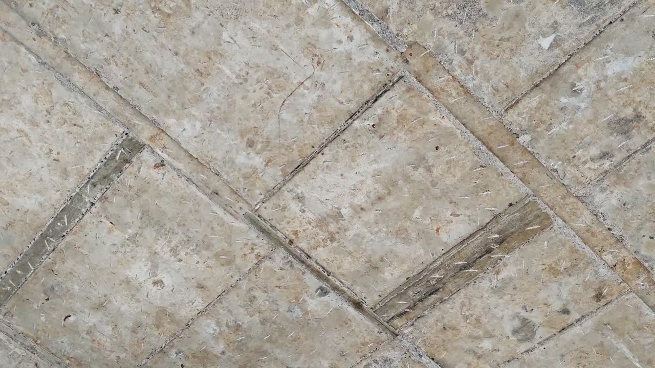 hand made Roof Chipping work in construction site. day time, semi circle shot, 4k