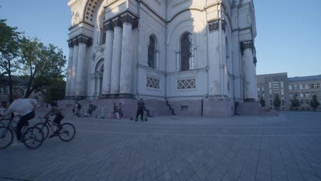 a beautiful white church and blue sky in the city centre of kaunas, lithuania