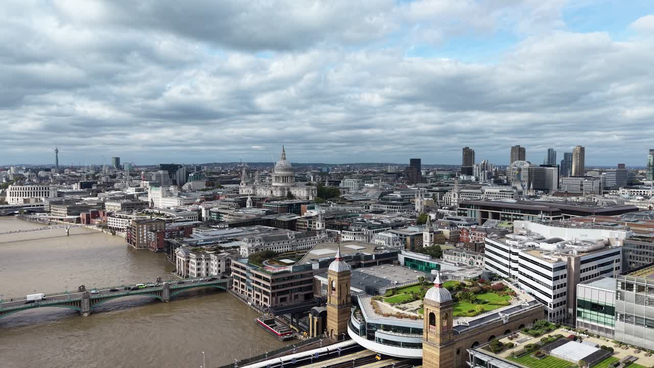 Panning drone aerial London city skyline St Pauls cathedral wide shot 4K footage