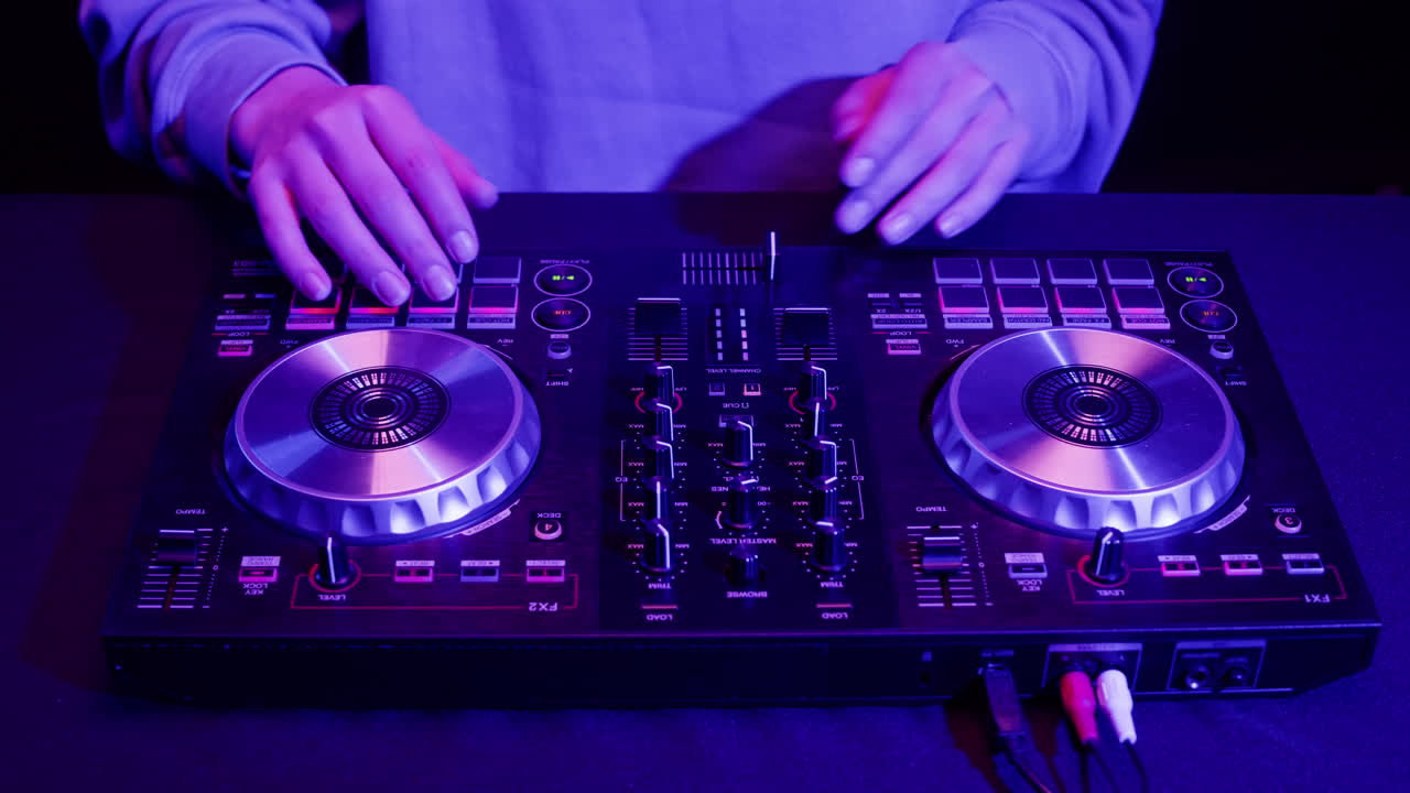 Vibrant DJ Mix Performance Closeup view of hands and equipment during a live music performance, city event, dj set in music techno club