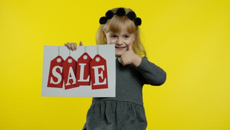 Great-discounts-for-preschool-kids.-Child-girl-showing-Sale-word-inscription-banner.-Black-Friday