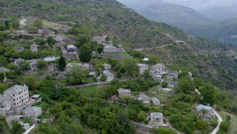 kalarrytes (kalarites) tzoumerka epirus greece, aerial point of interest shot, panoramic view of stone build houses traditional village and greek mountainous nature
