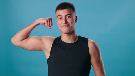 man posing and flexing his biceps