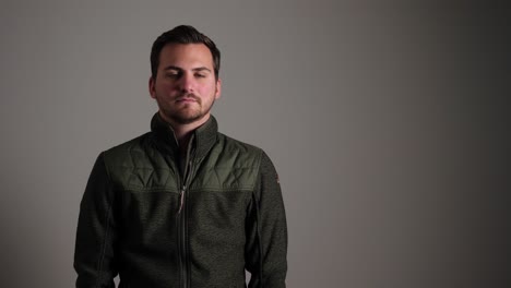 portrait of a mature young man in a windcheater jacket