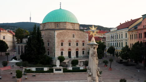 Exterior-Of-Pasha-Qasim-Mosque-In-Pecs,-Hungary---aerial-pullback