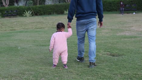 father and son walking and spending quality time together at outdoor at evening