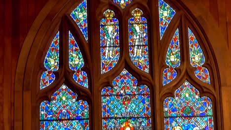 shot-of-the-beautiful-window-art-in-a-religious-Christian-or-catholic-chapel