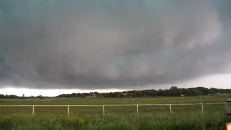 storm clouds swirling over a farm in central texas 4k