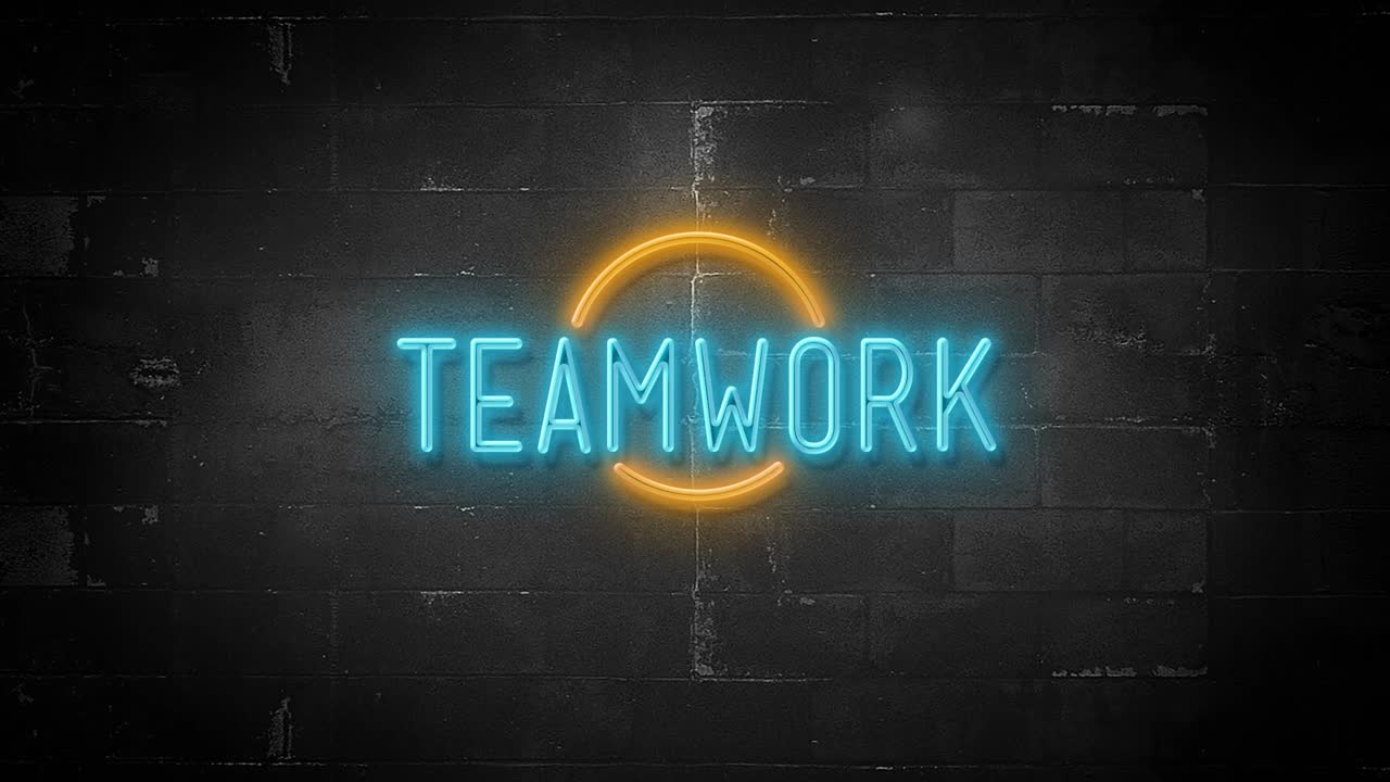 4k 해상도에서 박이는 네온 표지판에 팀워크 메시지 발