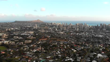 version two. timelapse aerial over resedential area in honolulu. waikiki beach and diamond head in the background.