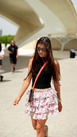 young woman in fashionable outfit outdoors