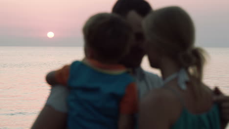 Lovely-family-of-three-together-by-the-sea