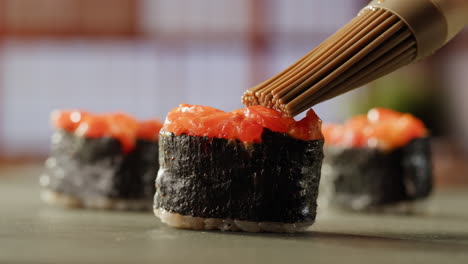 preparing salmon sushi