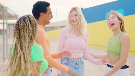 group of friends hugging and celebrating together
