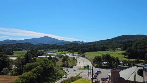 scenic view of korean countryside with mountains and road