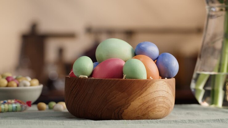 Happy Easter holiday. Colored eggs close-up. Preparing for Easter, painting and decorating eggs. Christian celebration, family traditions.