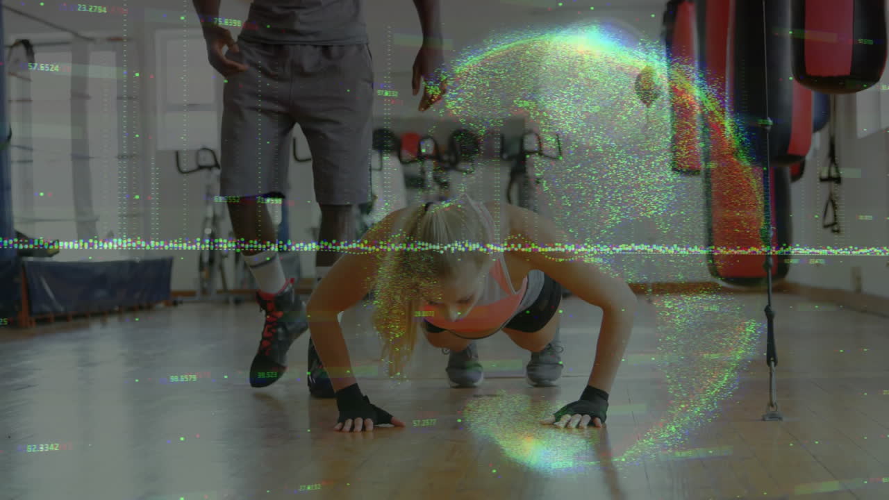 Female trainee holding push-up in fitness gym, trainer supervising with glitch overlay