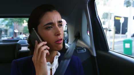 Businesswoman-talking-on-mobile-phone