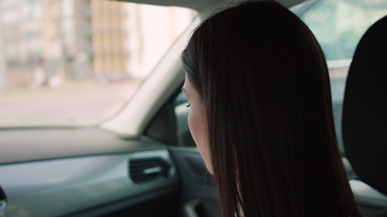 Woman traveling in a car