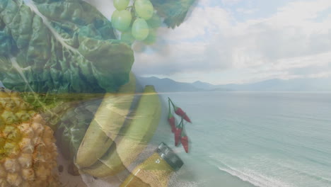 overlaying serene coastal landscape, tropical fruits and vegetables create animation effect