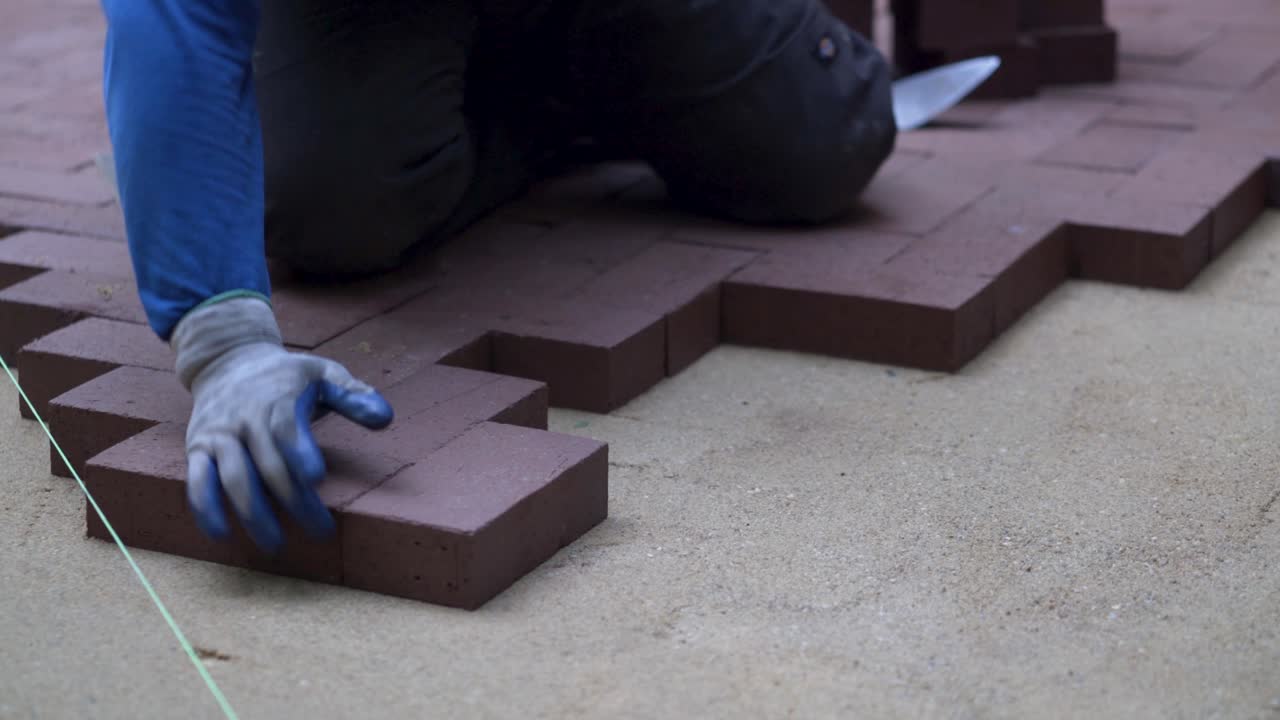 Laying Brick Pavers in a Herringbone Pattern