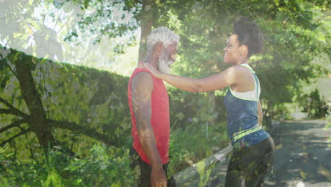 animación de árboles sobre una pareja afroamericana que se estira, en cámara lenta.