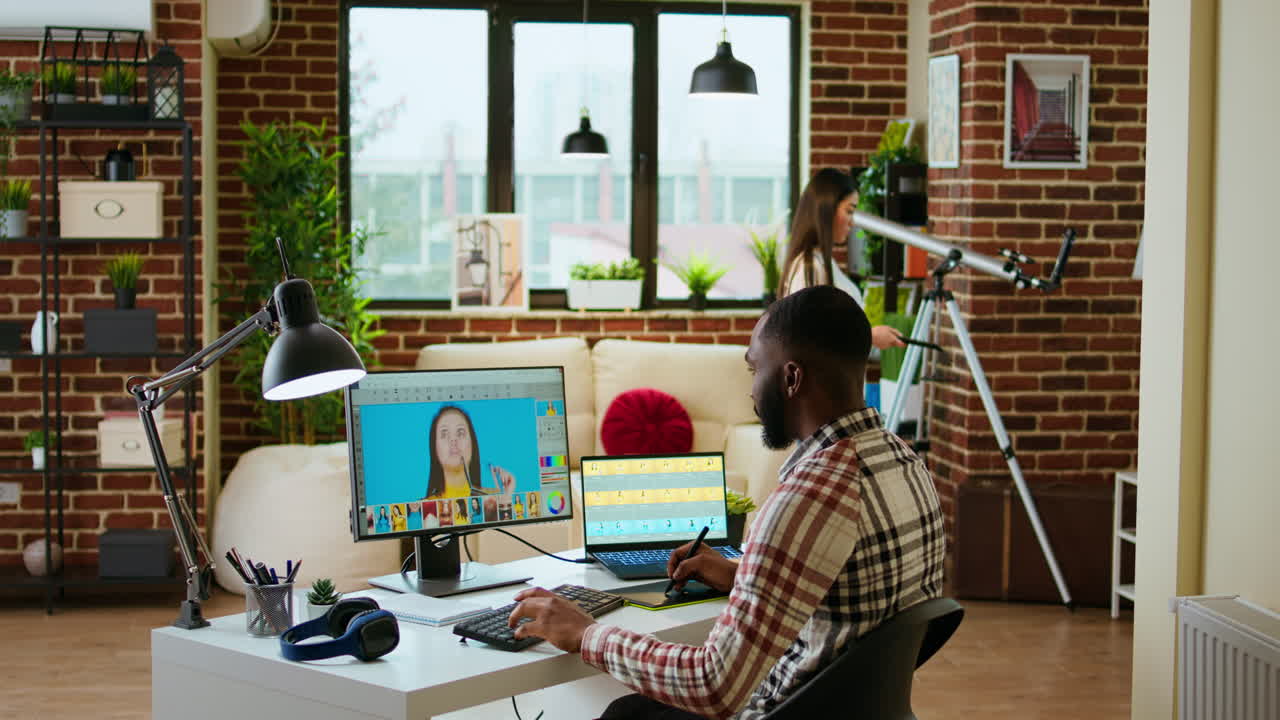 Freelance graphic designer editing photos on a modern computer setup