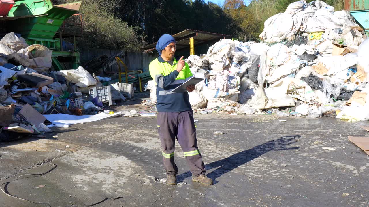 Recycling Facility with Worker and Waste