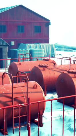 red barrels in a snowy landscape