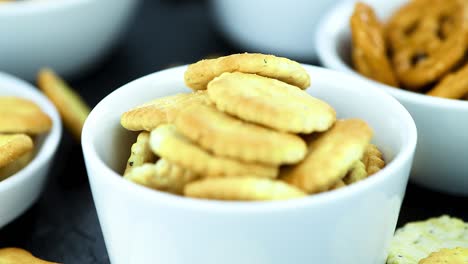 mixed snacks on a rotating plate (seamless loopable)