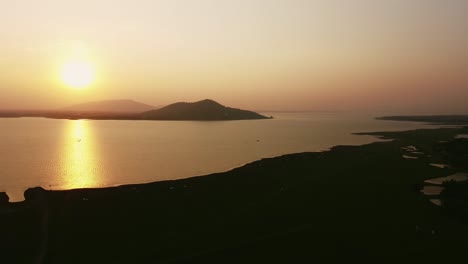 Aerial-shot-of-Landscape-at-the-end-of-Pa-Sak-Jolasid-Dam-on-sunset