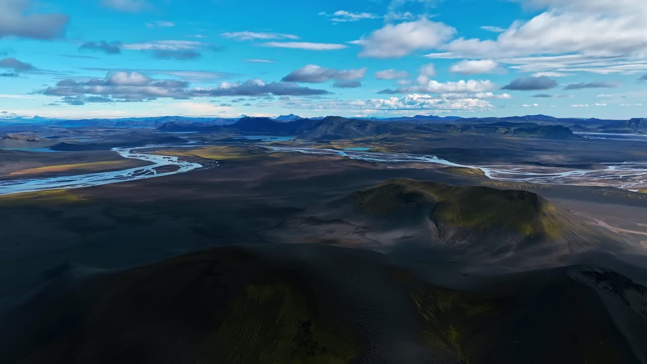 Aerial View of River Valley and Mountains