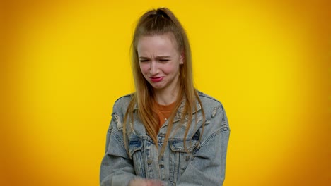 upset girl cries, raising hands in indignant expression asking why what reason of failure irritation