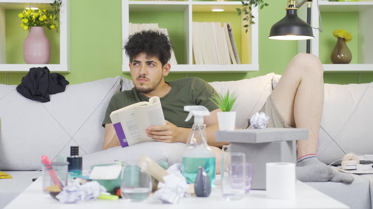 Messy university student studying at home.