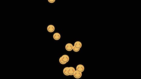 smiley emoticons falling against black and green backgrounds