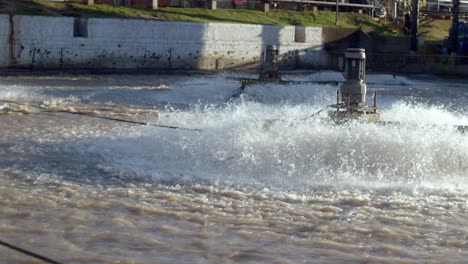 large vat of chemicals to clean and process raw cotton at a cotton factory or mill - slow motion