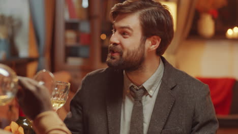 clinking glasses and chatting
