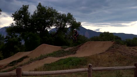 mountain biker jumping in slow motion