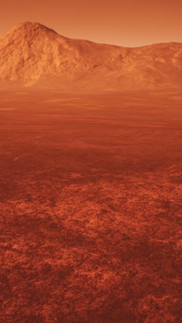 a red desert landscape with a mountain in the distance on mars.