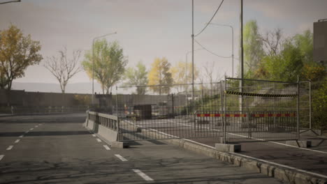 road closed with barriers and trees in an empty urban environment