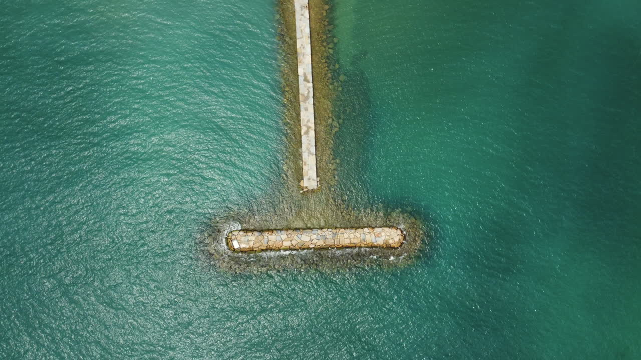 Aerial View of a Pier and Sea Wall
